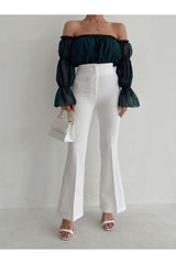 Aec Prive beyaz yüksek bel ispanyol paça pantolon ile şık bir kombin oluşturan model