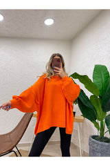 Aec Prive turuncu kadın oversize kazak, rahat kesim ve şık görünüm için ideal bir tercih.