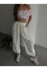 Aec Prive pamuklu müslin şalvar pantolon, rahat ve şık beyaz tasarımıyla günlük kullanıma uygun