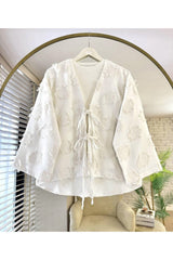 Aec Prive yazlık müslin kimono gömlek, hafif ve şık tasarımıyla yaz aylarında rahat kullanım için ideal.