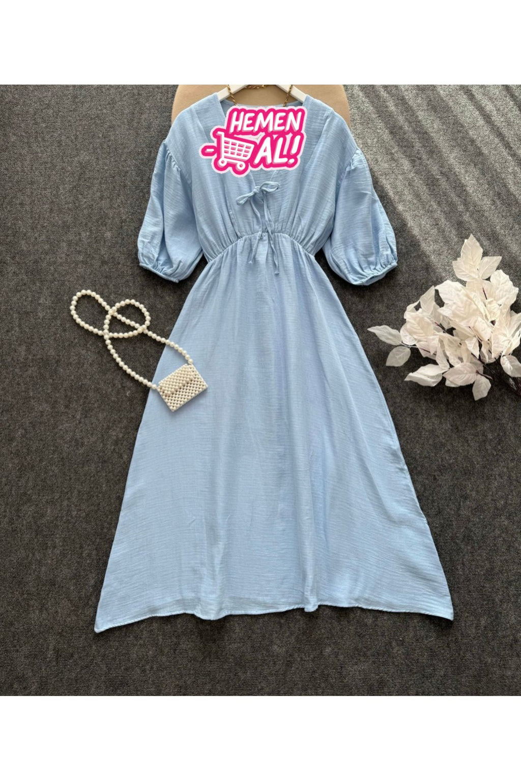 Aec Prive kadın yazlık uzun elbise, mavi renkte ve rahat bir tasarıma sahip.