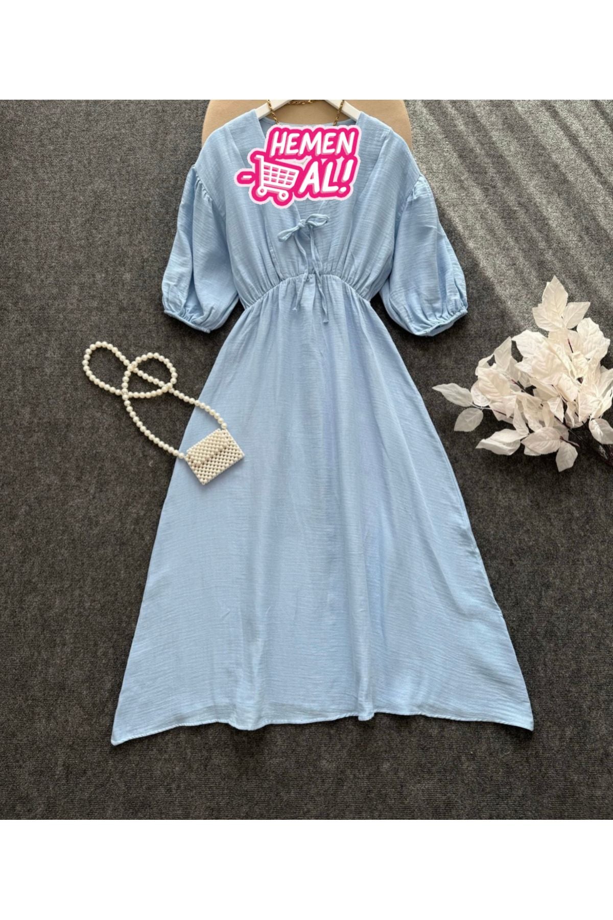 Aec Prive kadın yazlık uzun elbise, mavi renkte ve rahat bir tasarıma sahip.