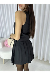 Aec Prive siyah kadın yelek etek takım, şık kesim ve pleated detaylarla modern bir görünüm sunuyor.