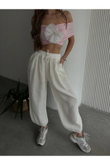 Aec Prive pamuklu müslin şalvar pantolon, rahat ve şık beyaz tasarımıyla günlük kullanıma uygun